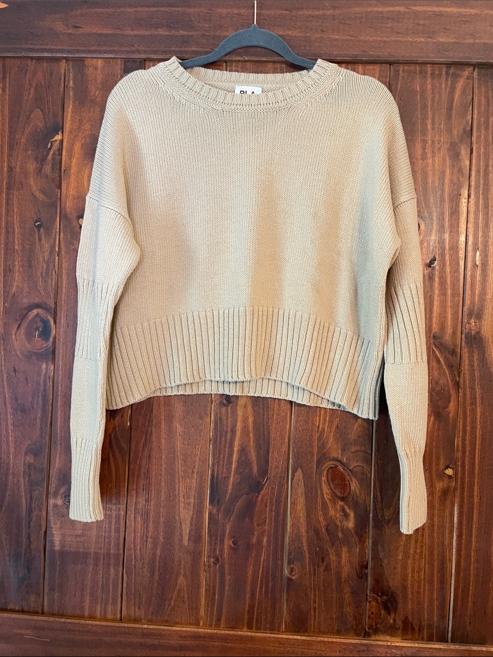 Boxy Cropped Crewneck Sweater with Back Cut Out in Light Tan